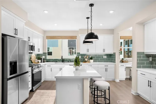 a bathroom with a sink a toilet and a bathtub