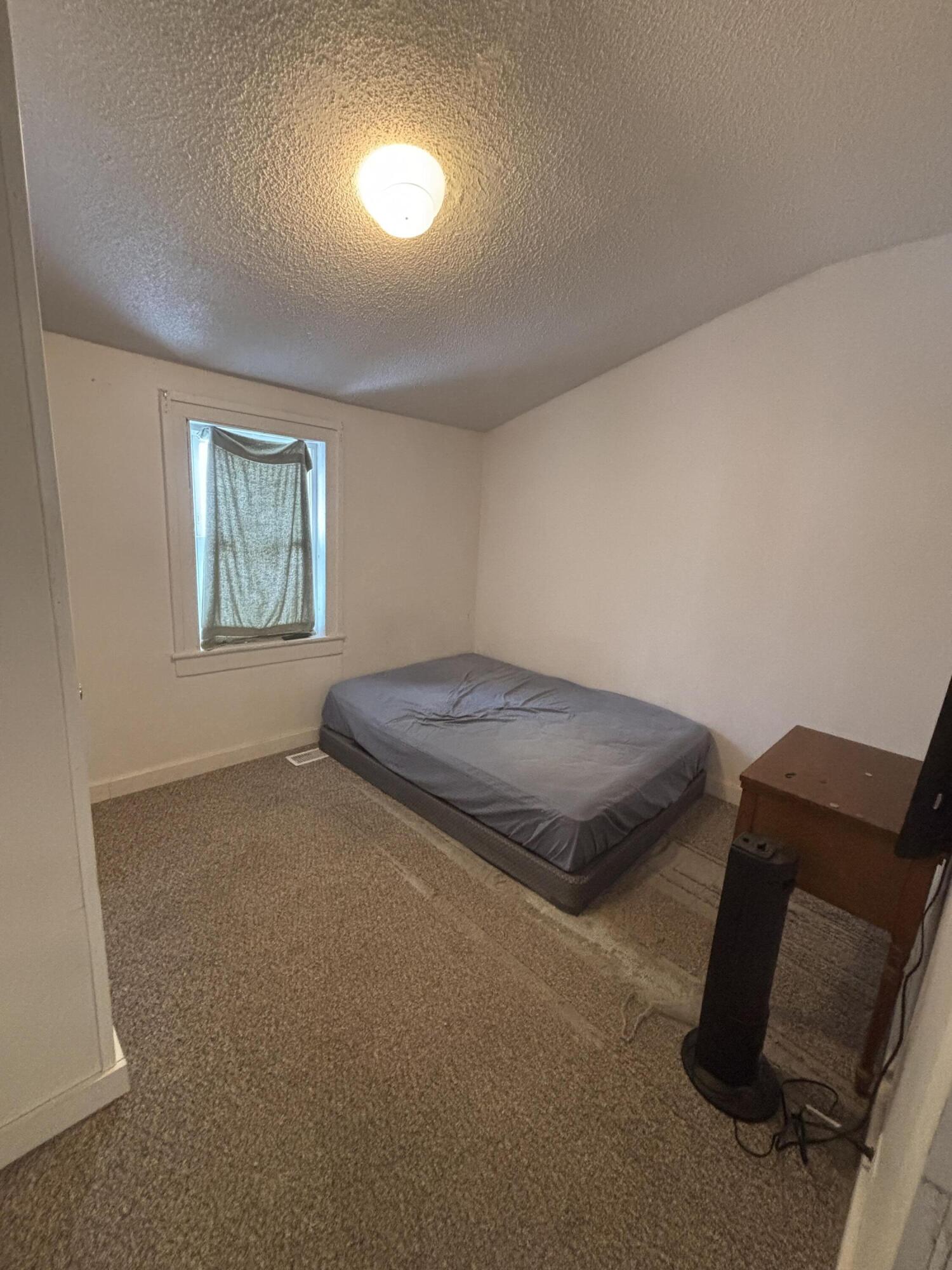 1002 Franklin Avenue Rochester, IN 46975 - Photo 5 of 15 an empty room with windows
