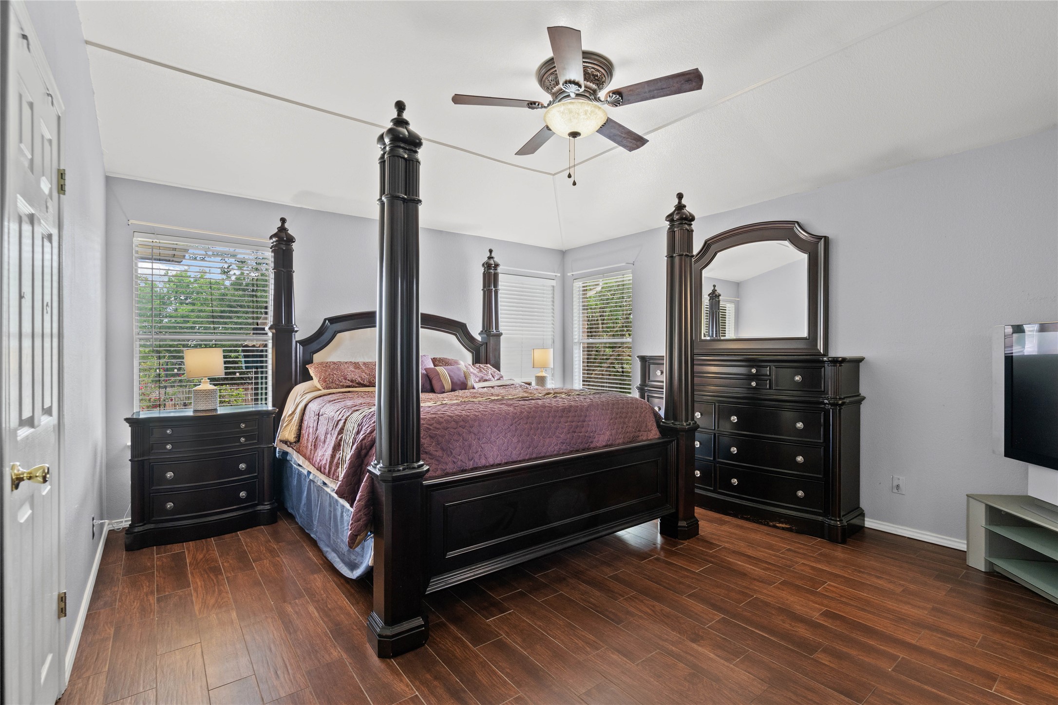 315 Appleton Court Buda, TX 78610 - Photo 9 of 28 a bedroom with a bed and a tv on table