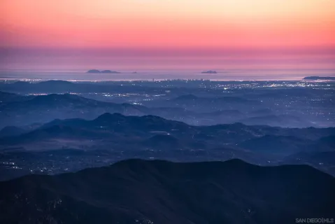 a view of city and mountain