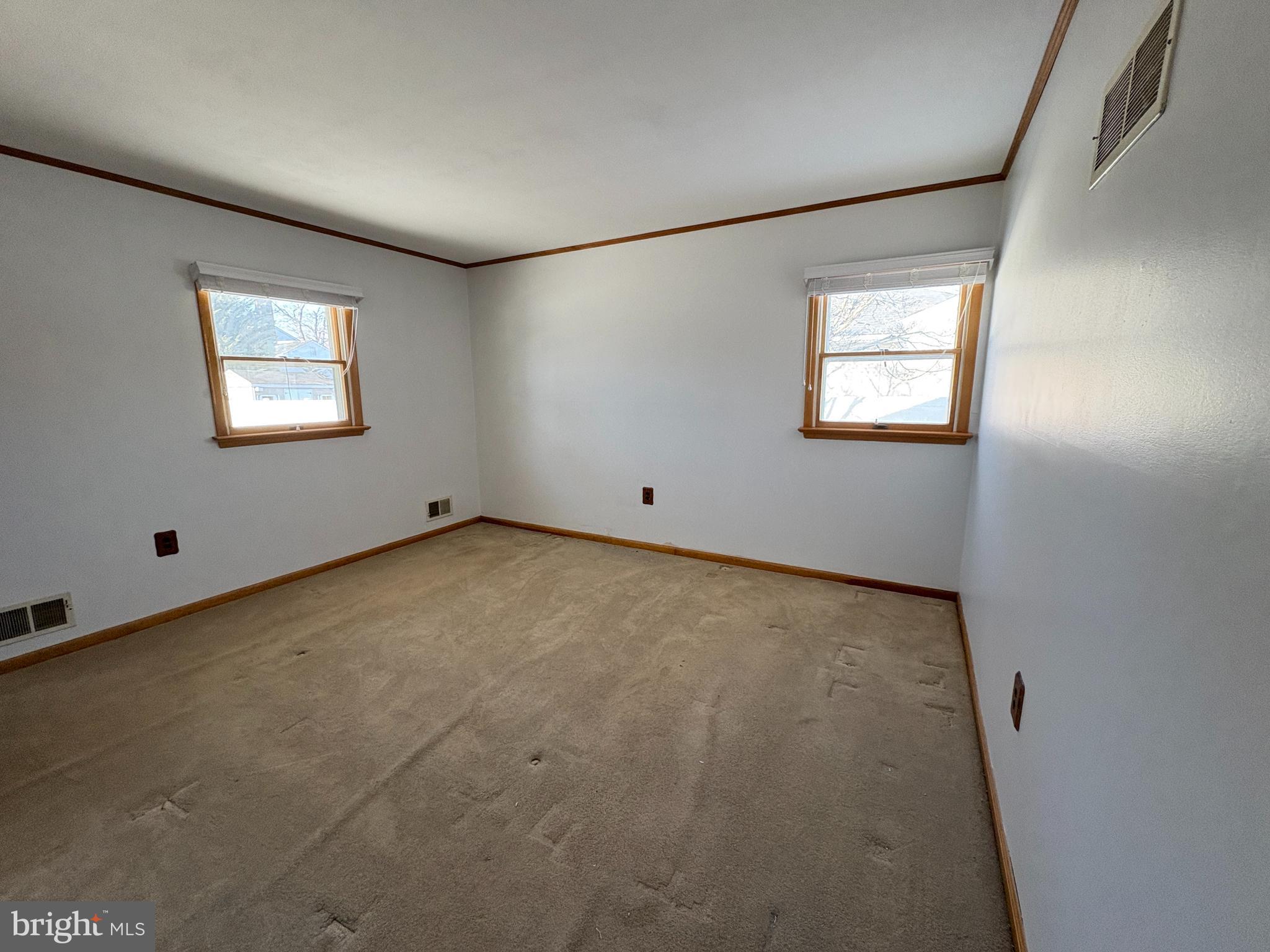 16 Senf Drive Hamilton, NJ 08620 - Photo 8 of 11 an empty room with windows