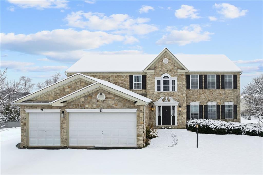 a view of multiple houses with a yard