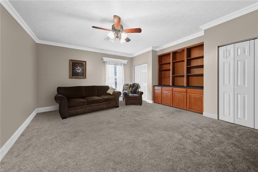 108 Stallion Road Clinton, PA 15026 - Photo 17 of 49 a living room with furniture and window