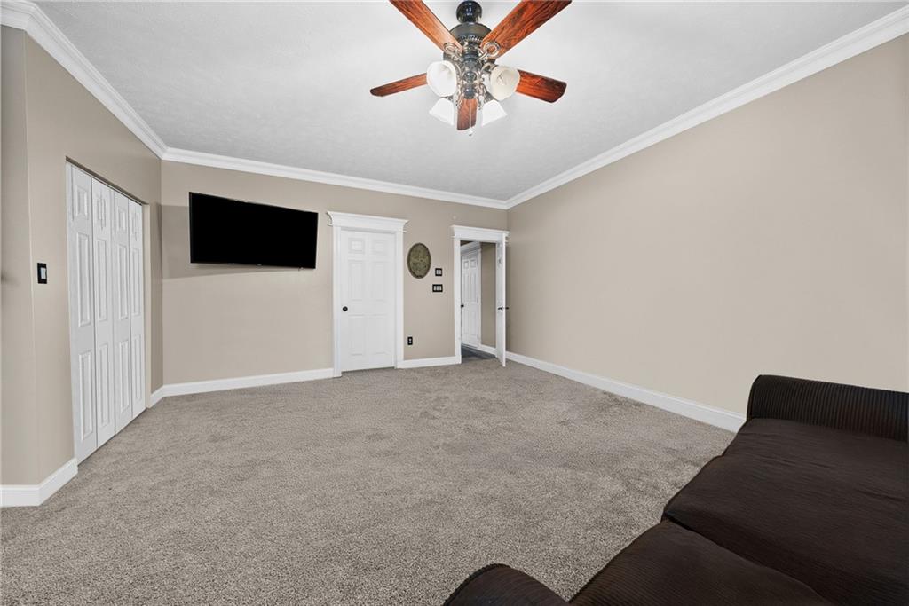 108 Stallion Road Clinton, PA 15026 - Photo 18 of 49 a living room with furniture and a flat screen tv