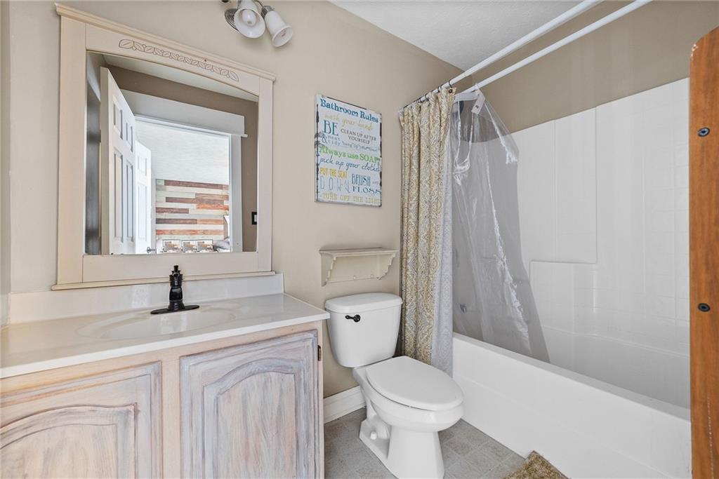 108 Stallion Road Clinton, PA 15026 - Photo 23 of 49 a bathroom with a granite countertop sink toilet and shower