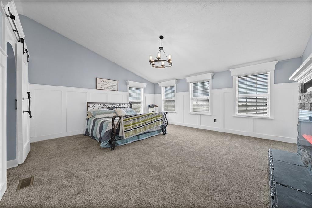 108 Stallion Road Clinton, PA 15026 - Photo 25 of 49 a spacious bedroom with a bed and a window