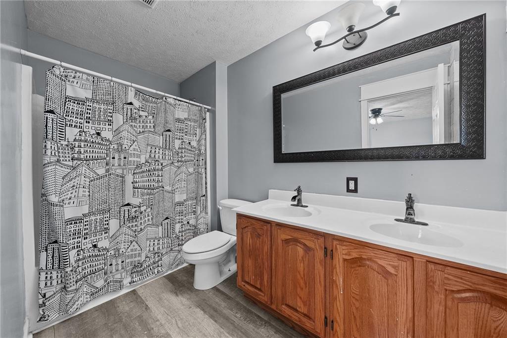 108 Stallion Road Clinton, PA 15026 - Photo 33 of 49 a bathroom with a sink and a mirror