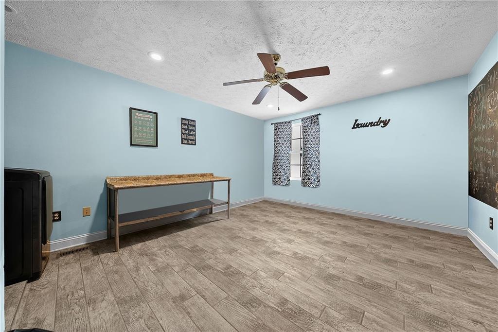 108 Stallion Road Clinton, PA 15026 - Photo 35 of 49 a bedroom with a bed and a window