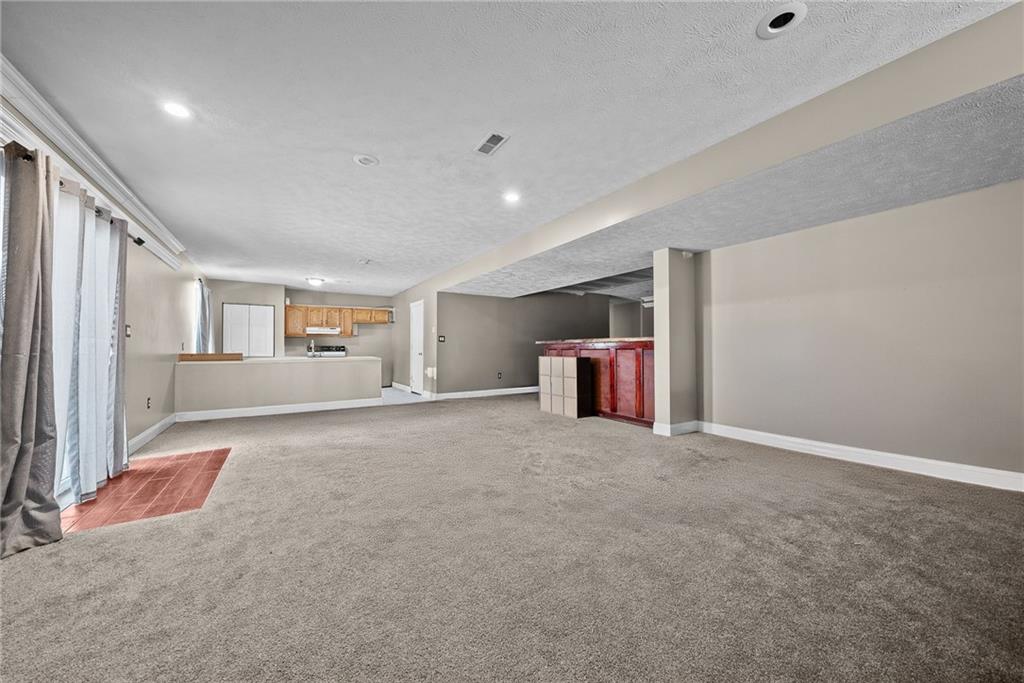 108 Stallion Road Clinton, PA 15026 - Photo 39 of 49 a view of an empty room with a window