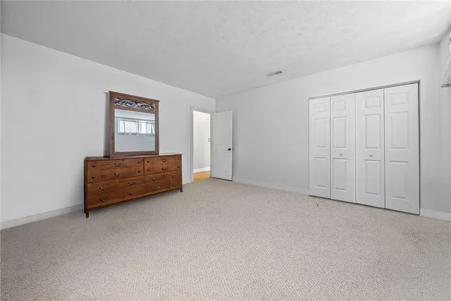 a view of a livingroom with furniture