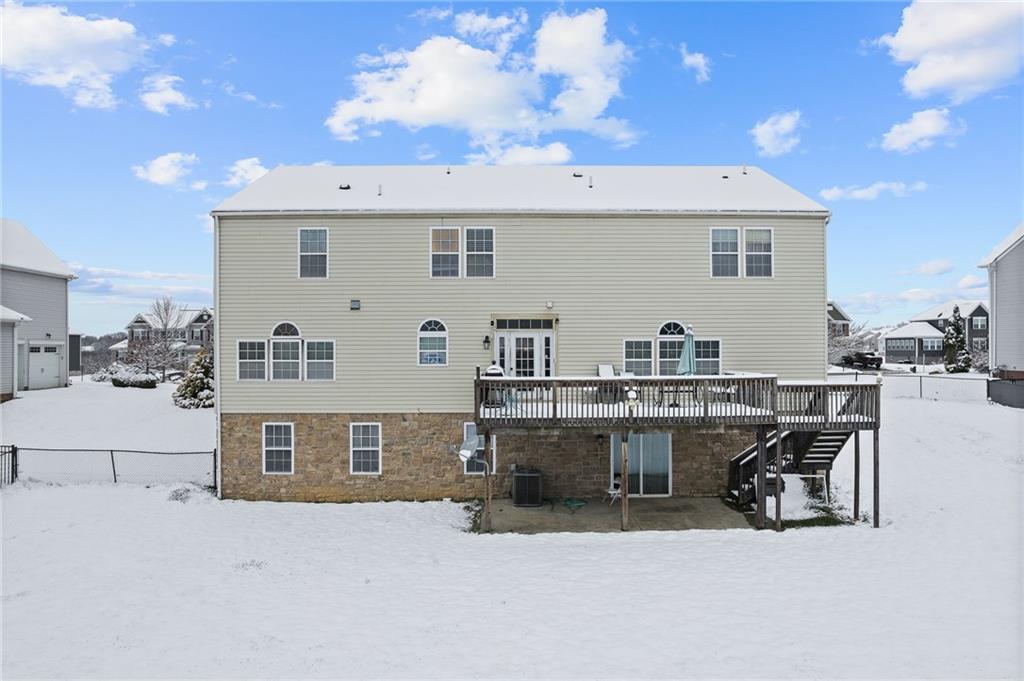 108 Stallion Road Clinton, PA 15026 - Photo 44 of 49 a view of a patio with a table and chairs