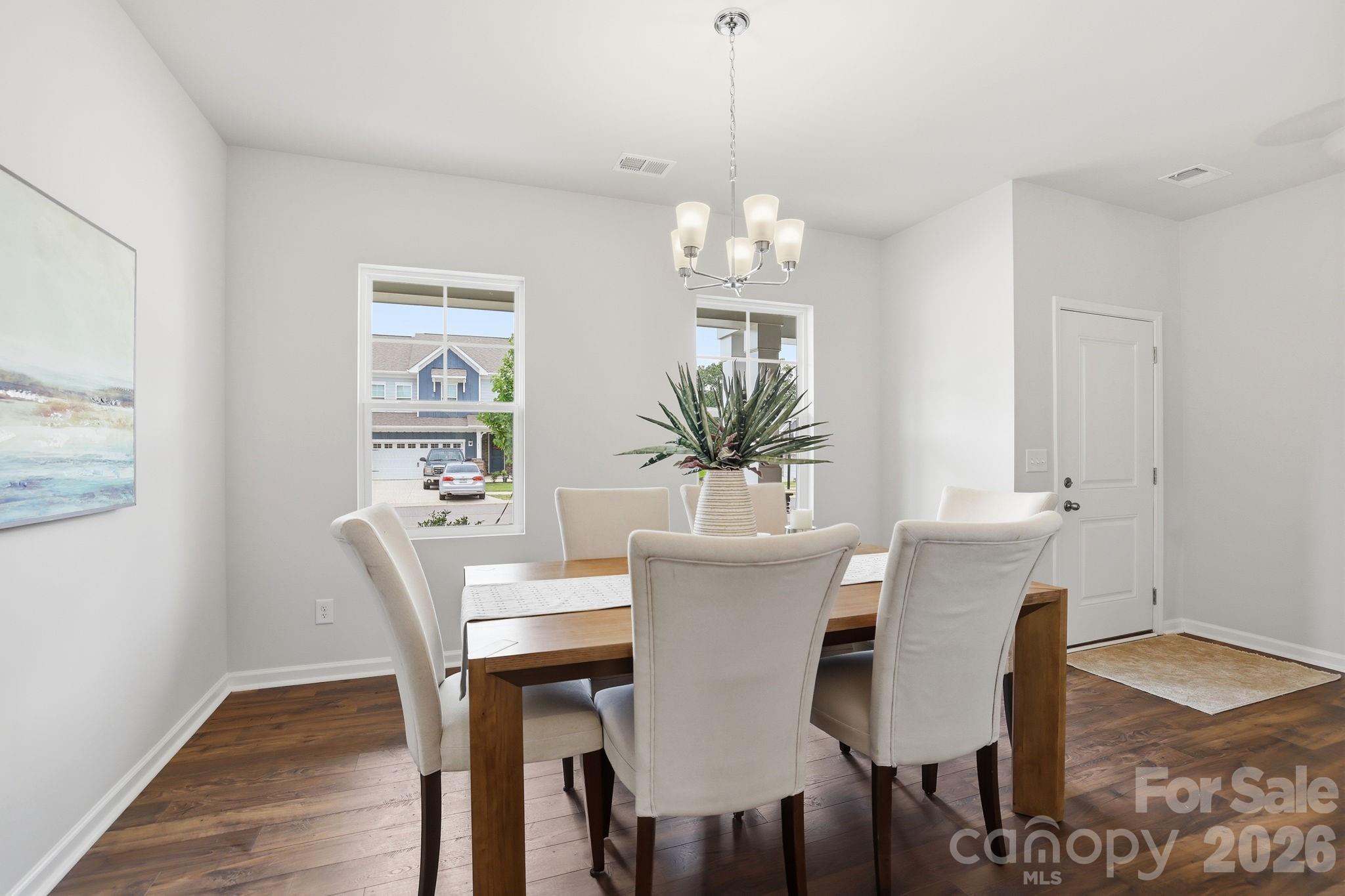 470 Brick House Road York, SC 29745 - Photo 9 of 39 a view of a dining room with furniture and wooden floor