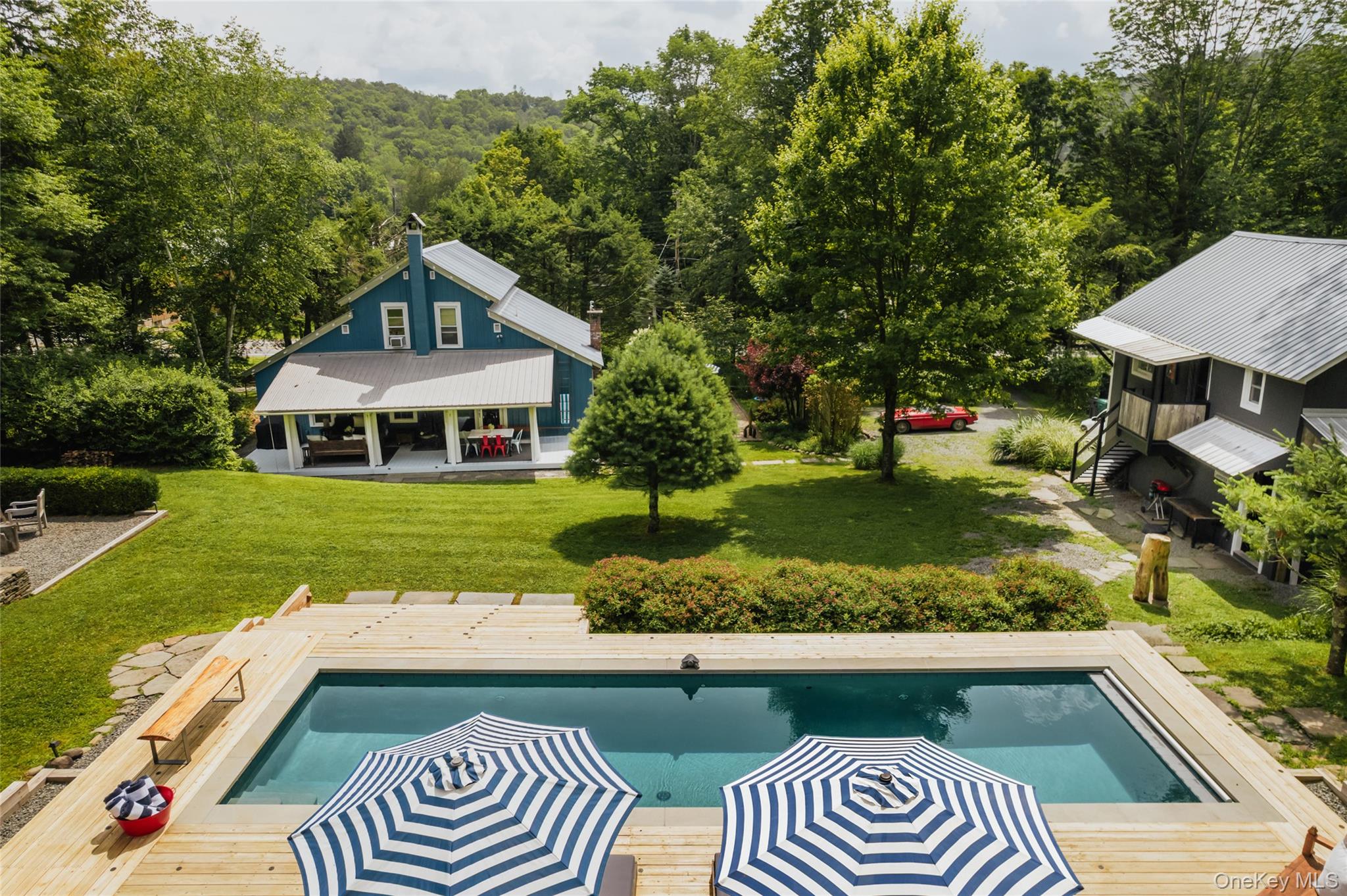 1680 Gulf Road North Branch, NY 12766 - Photo 1 of 45 Heated swimming pool with wooden deck