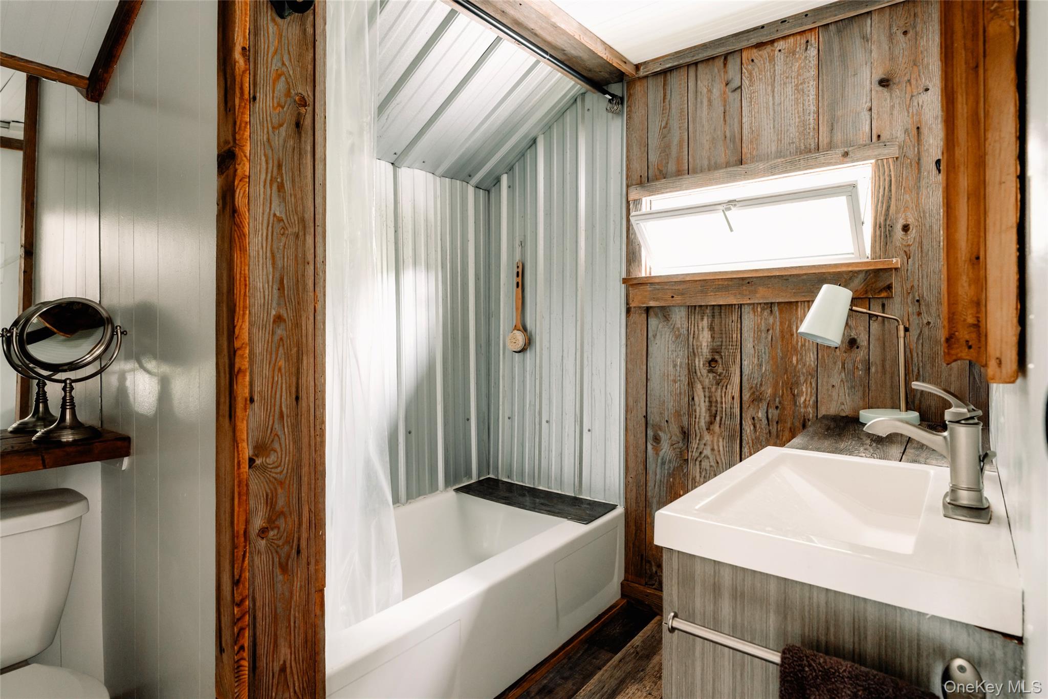 1680 Gulf Road North Branch, NY 12766 - Photo 29 of 45 Full bath featuring vanity, wood finished floors, and wooden walls