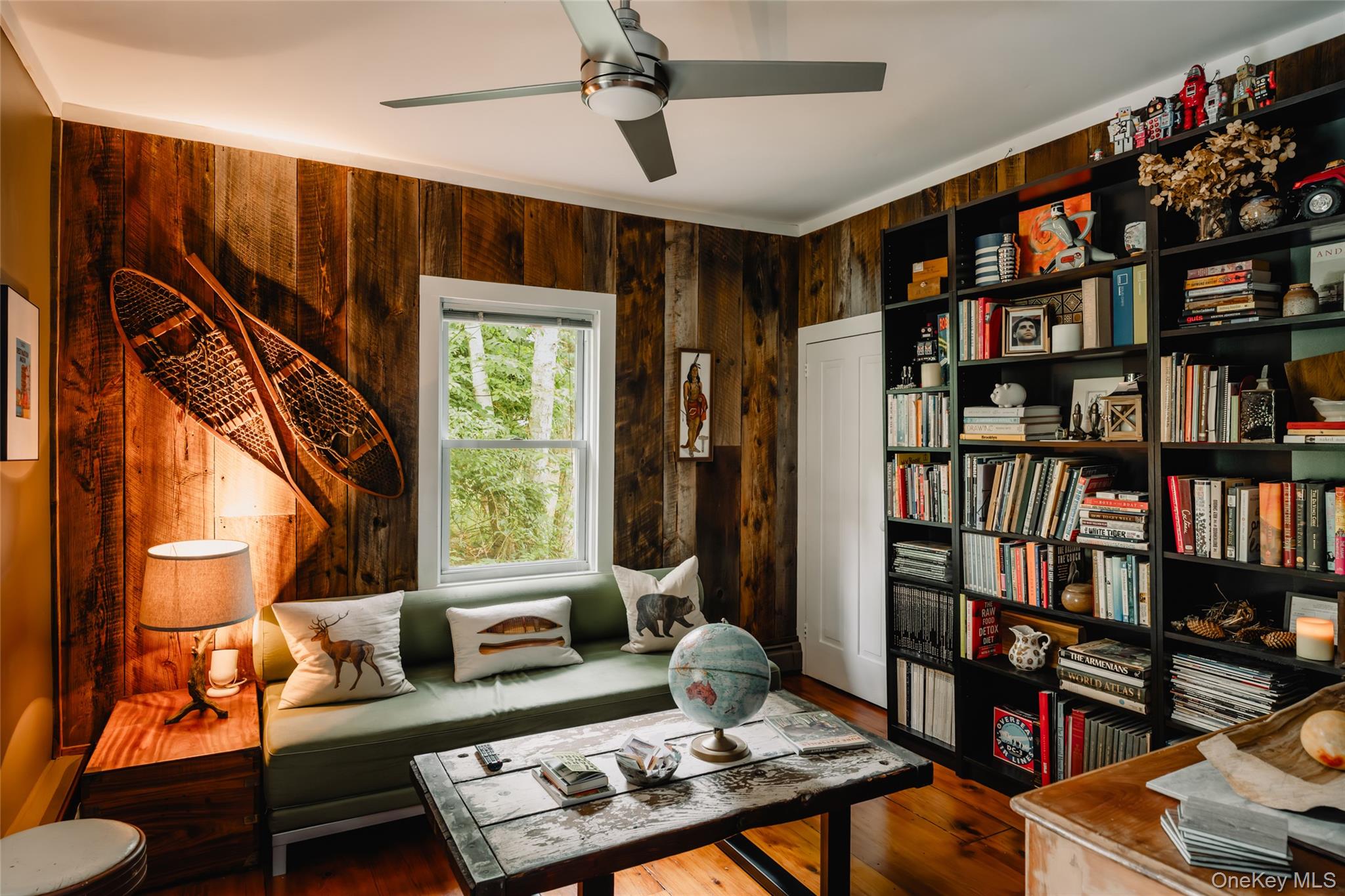 1680 Gulf Road North Branch, NY 12766 - Photo 6 of 45 Local barn wood paneling and built-in bookshelves