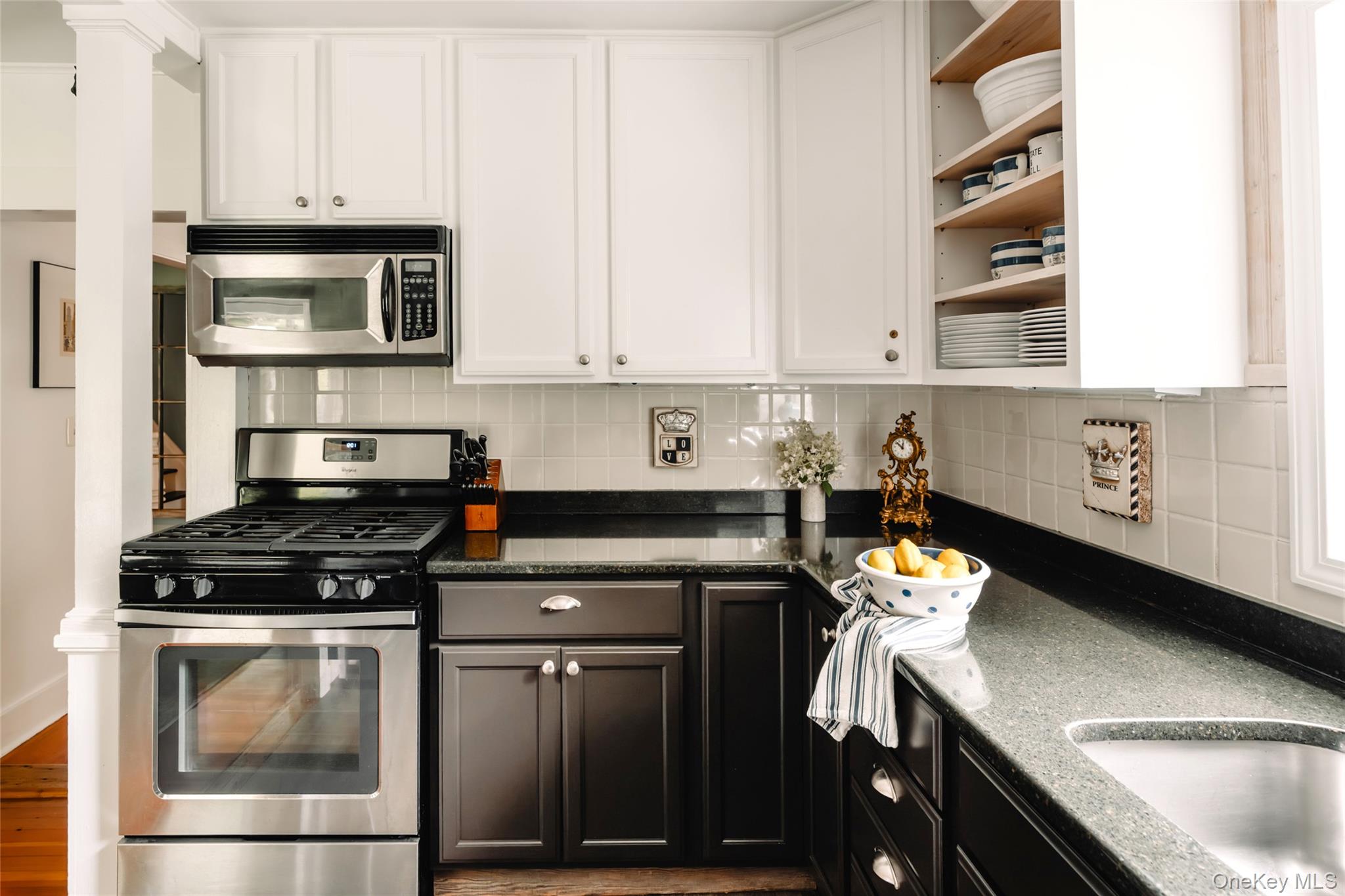 1680 Gulf Road North Branch, NY 12766 - Photo 10 of 45 Kitchen with appliances with stainless steel finishes, white cabinetry, open shelves, and backsplash