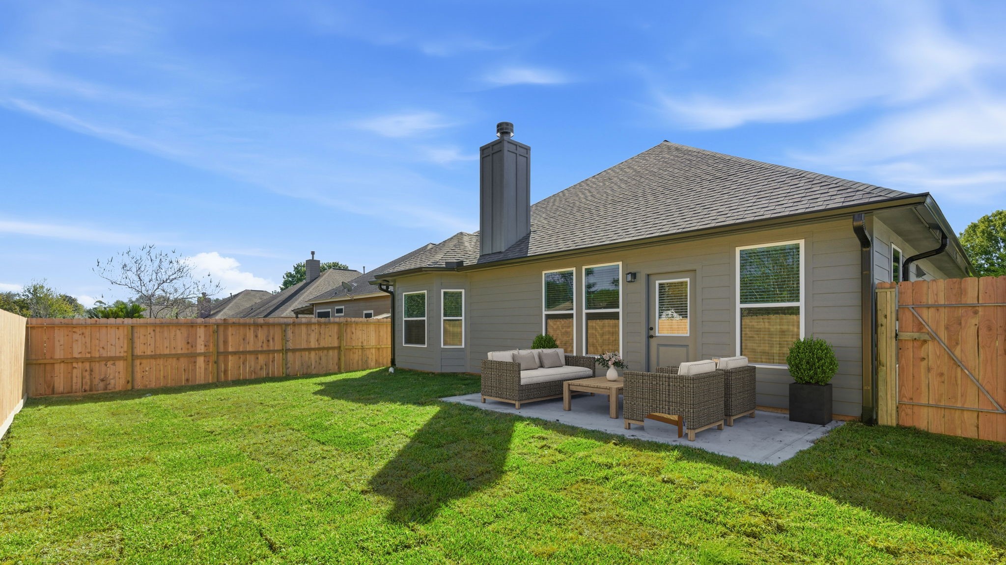 5227 Sunshine Point Willis, TX 77318 - Photo 25 of 33 SPACIOUS FENCED BACKYARD WITH SPRINKLER SYSTEM