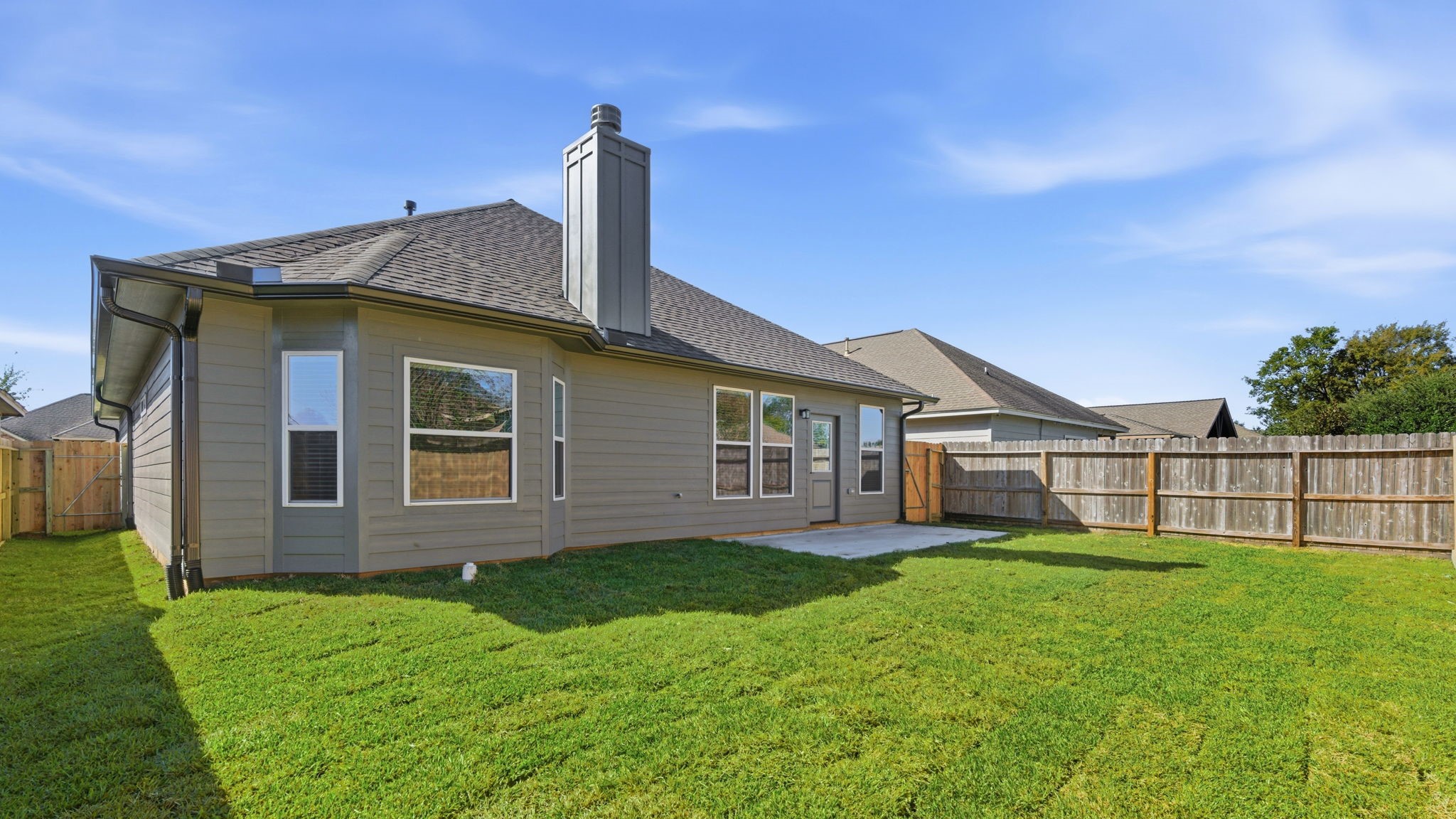 5227 Sunshine Point Willis, TX 77318 - Photo 26 of 33 PLUSH GRASS IN ALL AREAS AND FULLY FENCED!