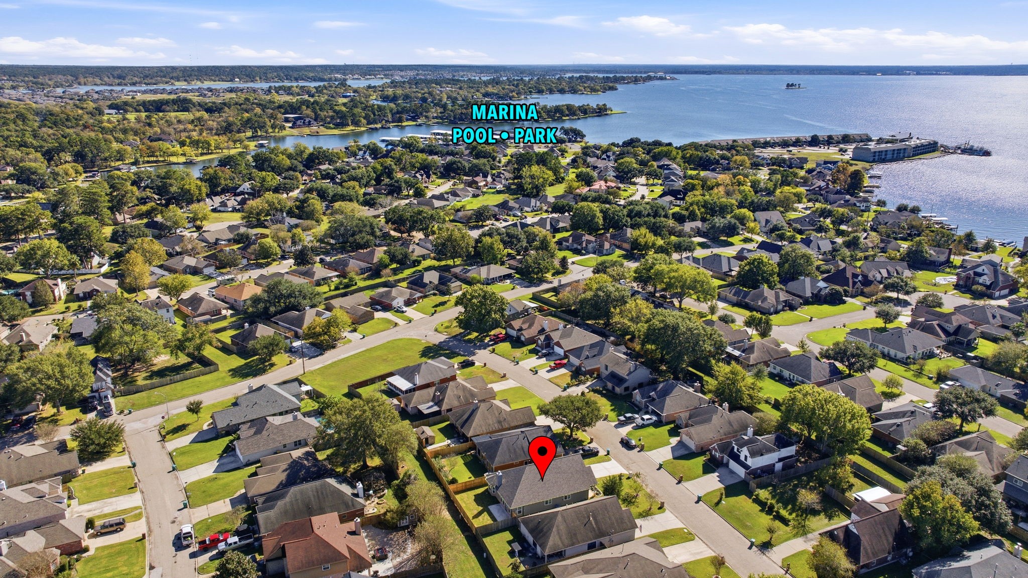 5227 Sunshine Point Willis, TX 77318 - Photo 30 of 33 NICE AMENITIES WITHIN THIS COMMUNITY! A MARINA, POOL, PARK TO PLAY AND MANY "GREEN" AREAS IN WHICH TO TAKE IN THE LAKE. PLUS A LARGE BOAT RAMP JUST OUTSIDE OF THE ENTRANCE.