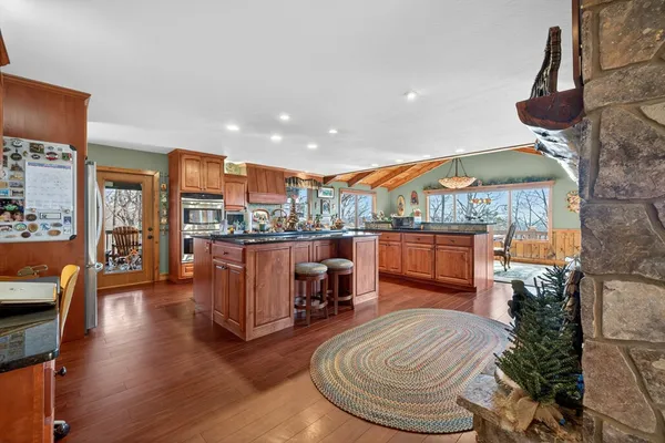 a view of deck with furniture and wooden floor