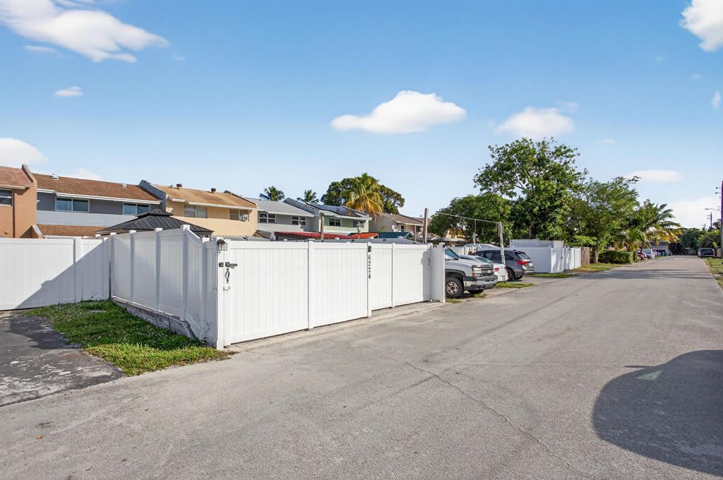 6224 Southwest 7th Street Margate, FL 33068 - Photo 14 of 51 a view of a cars park in front of a house