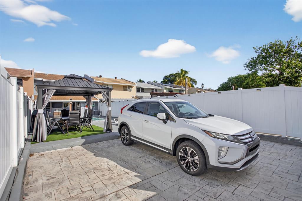 6224 Southwest 7th Street Margate, FL 33068 - Photo 20 of 51 a car parked in front of a building