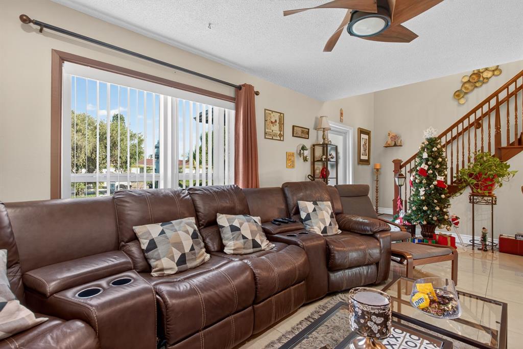 6224 Southwest 7th Street Margate, FL 33068 - Photo 24 of 51 a living room with furniture and a large window