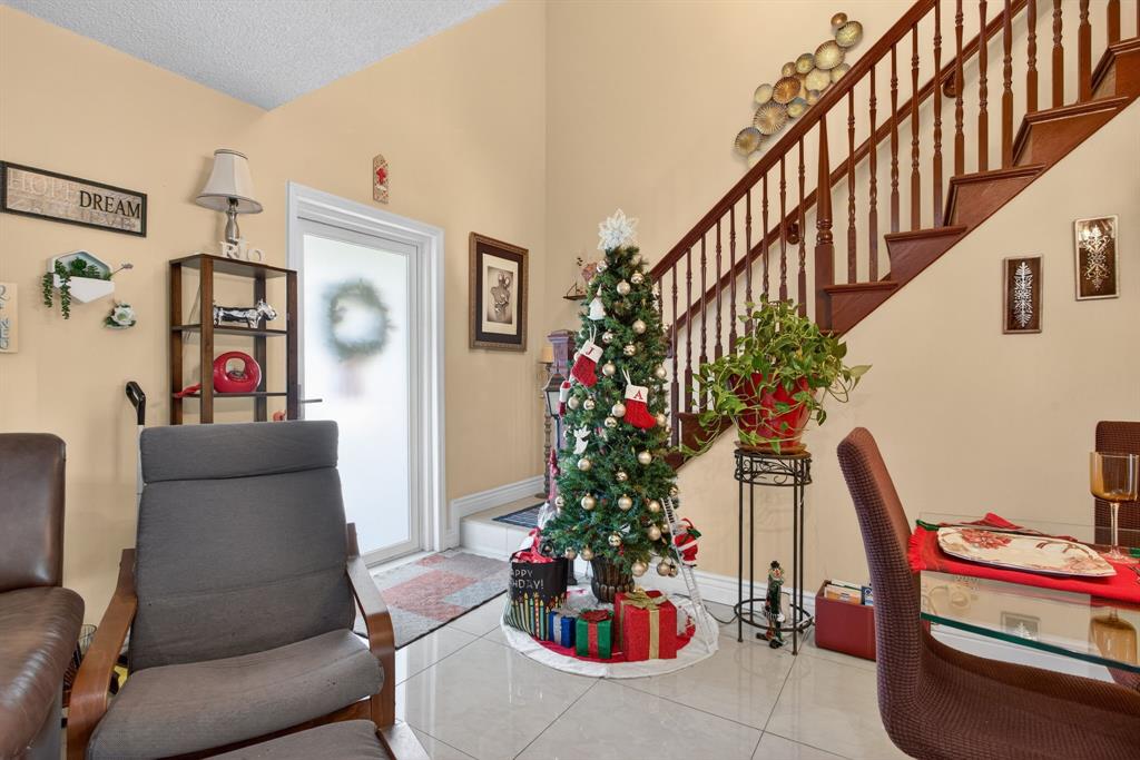 6224 Southwest 7th Street Margate, FL 33068 - Photo 26 of 51 a living room with furniture and flowers
