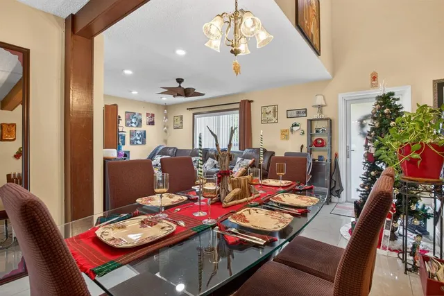 a kitchen with stainless steel appliances granite countertop a stove and a refrigerator