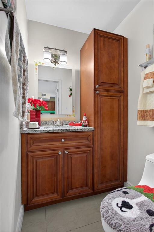 6224 Southwest 7th Street Margate, FL 33068 - Photo 35 of 51 a bathroom with a sink and a mirror