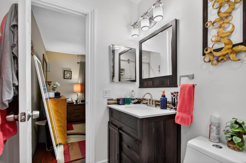 6224 Southwest 7th Street Margate, FL 33068 - Photo 40 of 51 a bathroom with a sink vanity and mirror