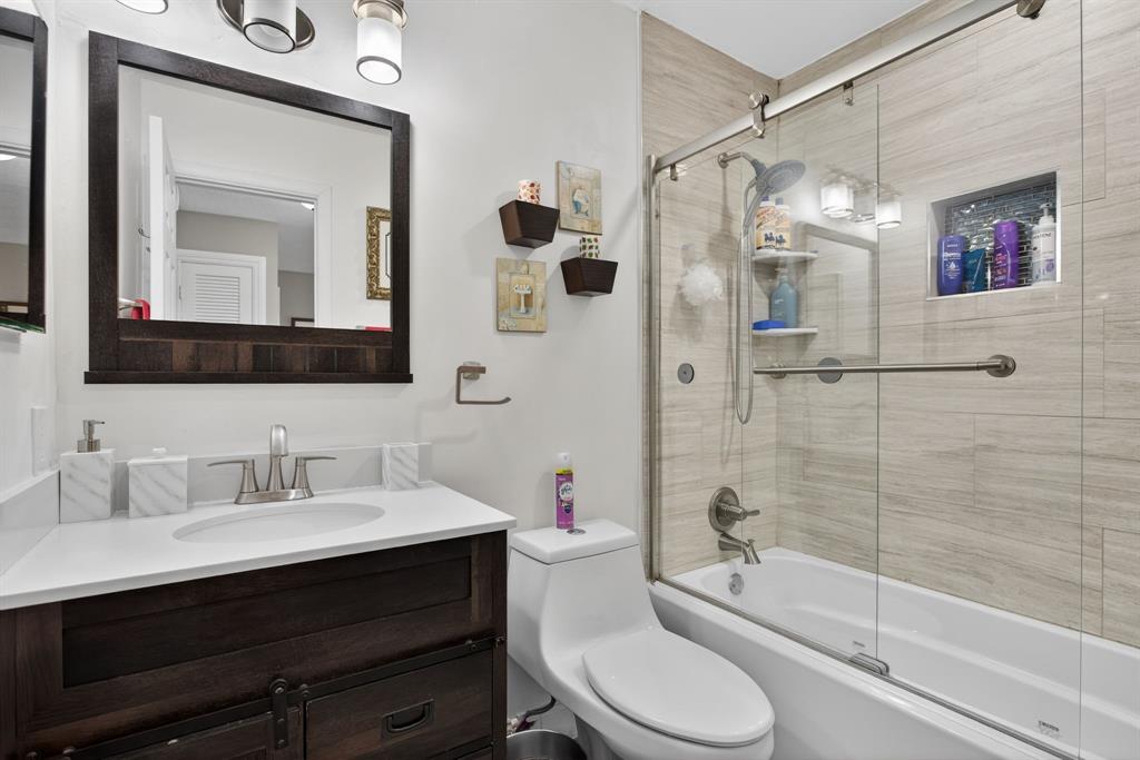 6224 Southwest 7th Street Margate, FL 33068 - Photo 41 of 51 a bathroom with a sink a toilet and shower