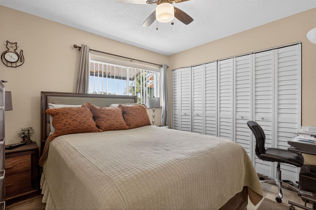 6224 Southwest 7th Street Margate, FL 33068 - Photo 42 of 51 a bedroom with a bed and a window