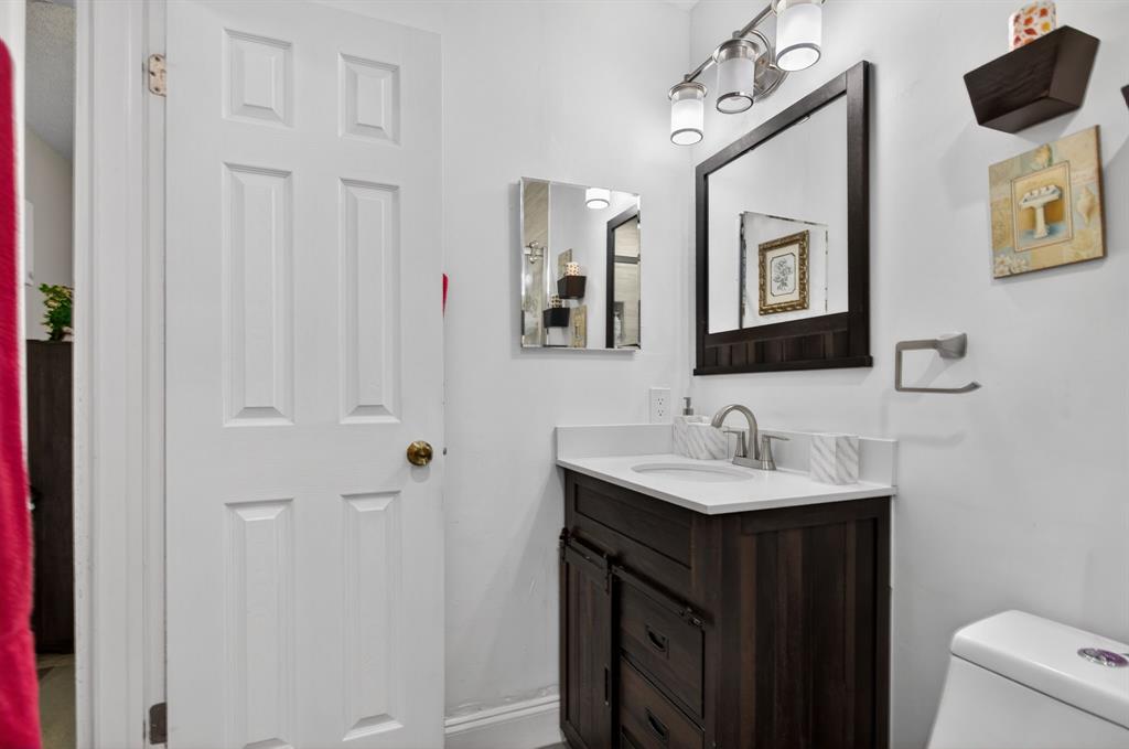 6224 Southwest 7th Street Margate, FL 33068 - Photo 43 of 51 a bathroom with a sink and a mirror