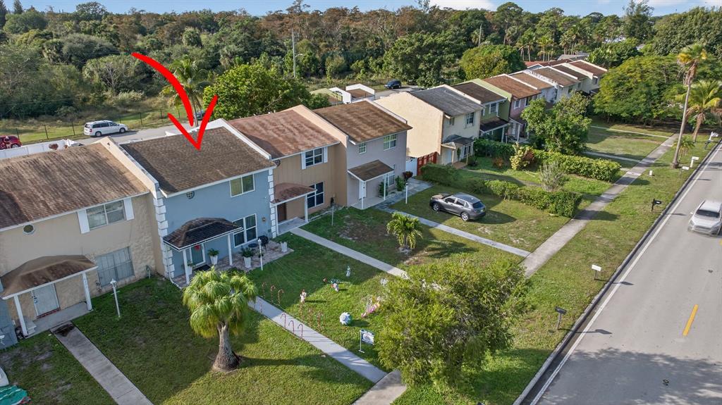 6224 Southwest 7th Street Margate, FL 33068 - Photo 48 of 51 an aerial view of multiple houses with yard