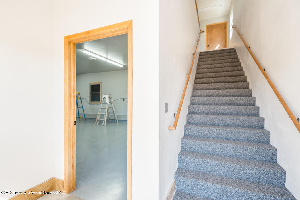 1317 East 17th Street Rifle, CO 81650 - Photo 32 of 57 a view of entryway and hall with wooden floor
