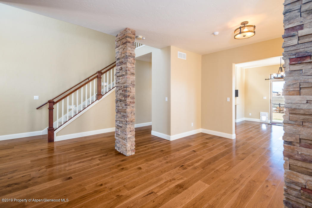 1317 East 17th Street Rifle, CO 81650 - Photo 9 of 57 a view of entryway with wooden floor