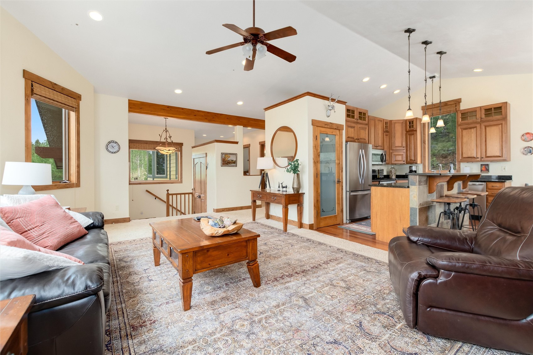 592 Ponderosa Road Fairplay, CO 80440 - Photo 8 of 45 a living room with furniture ceiling fan and a rug