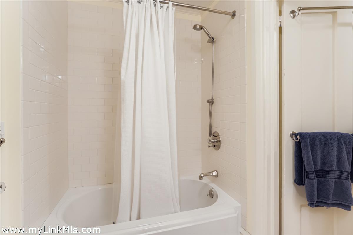 27 Spring Street Vineyard Haven, MA 02568 - Photo 37 of 58 a bathroom with a bathtub