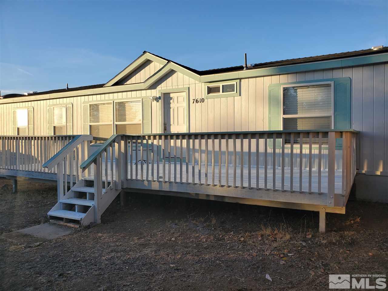 7610 Lytton Road Reno, NV 89506 - Photo 1 of 17 a view of a house with wooden deck