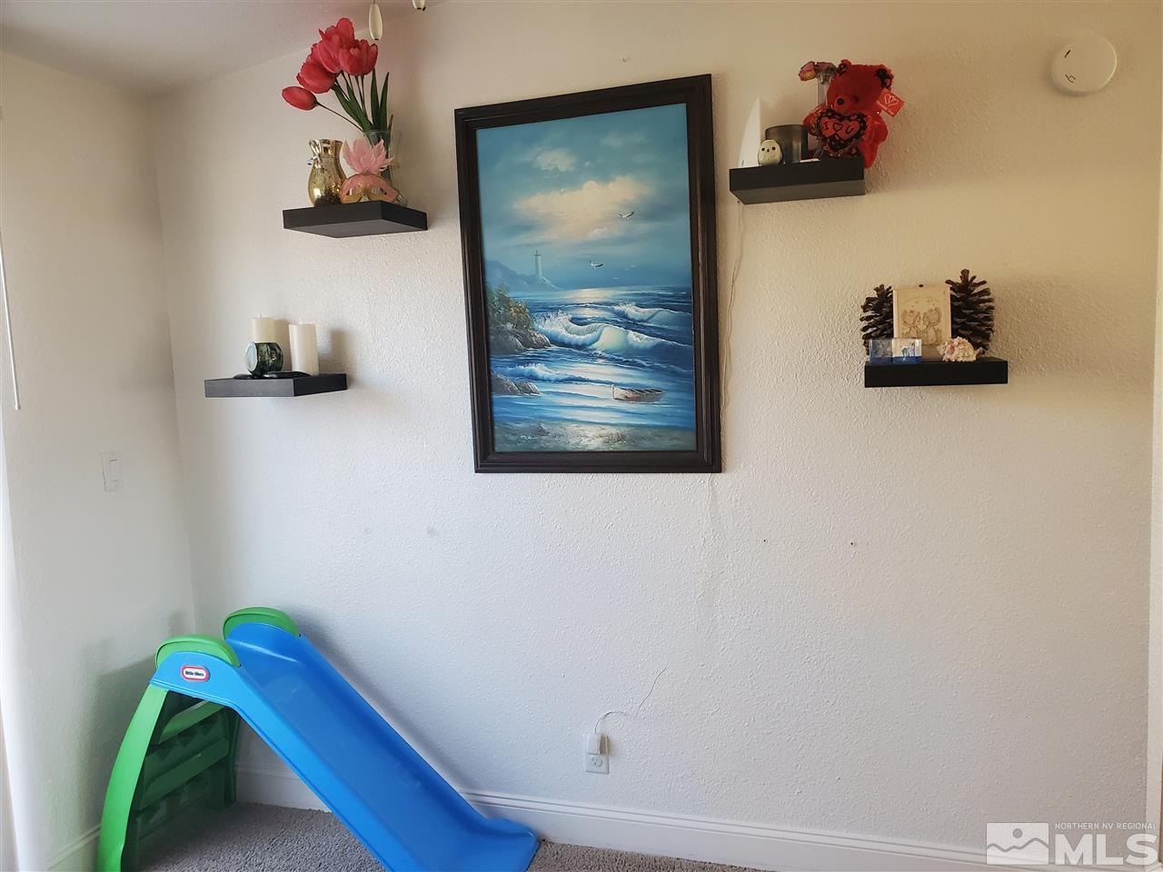 7610 Lytton Road Reno, NV 89506 - Photo 13 of 17 a room with toys and closet