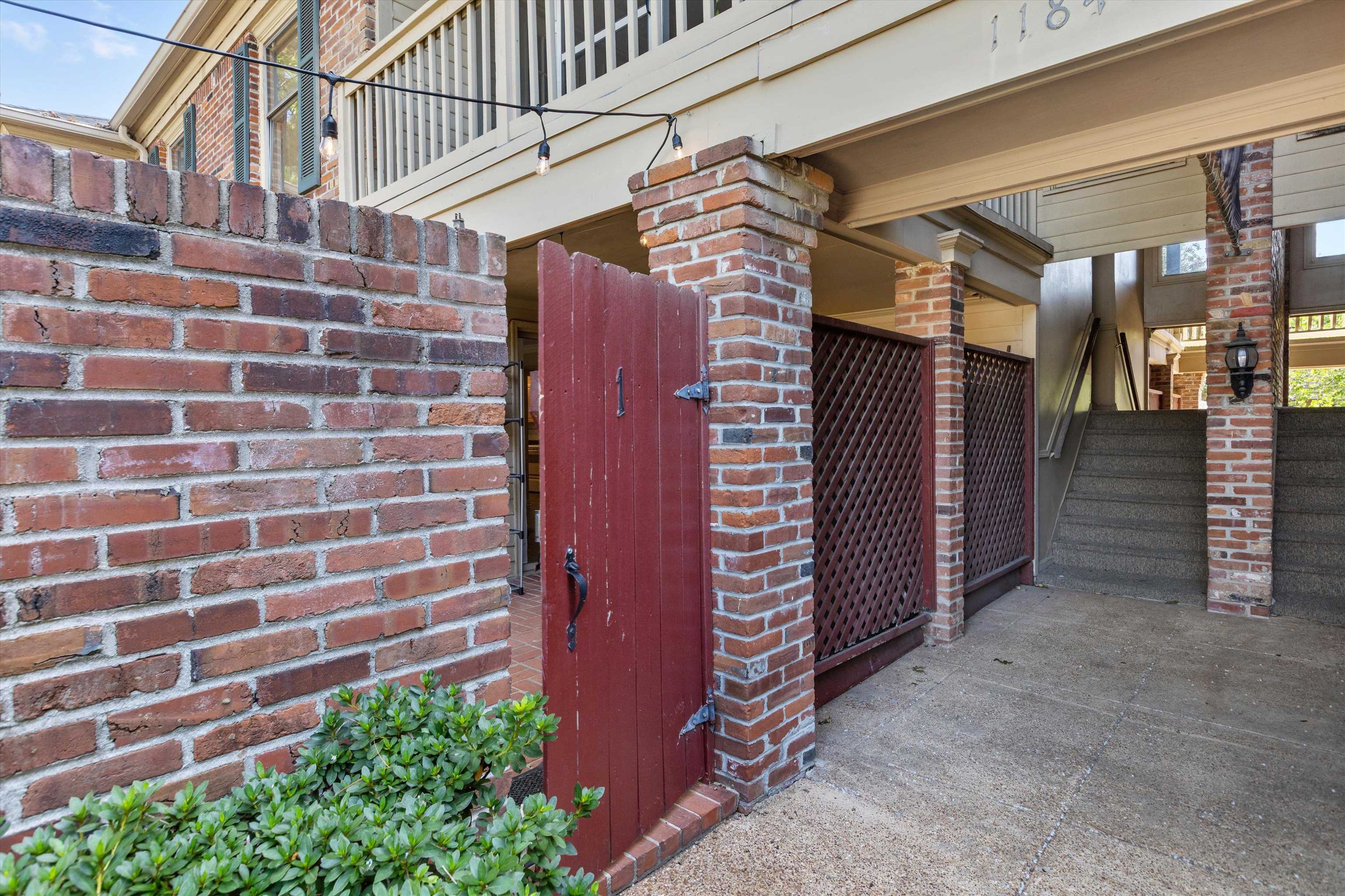 1184 Lynnfield Road, Unit 1 Memphis, TN 38119 - Photo 2 of 28 Ground-level access with a private gate that leads into your own covered porch and private patio.