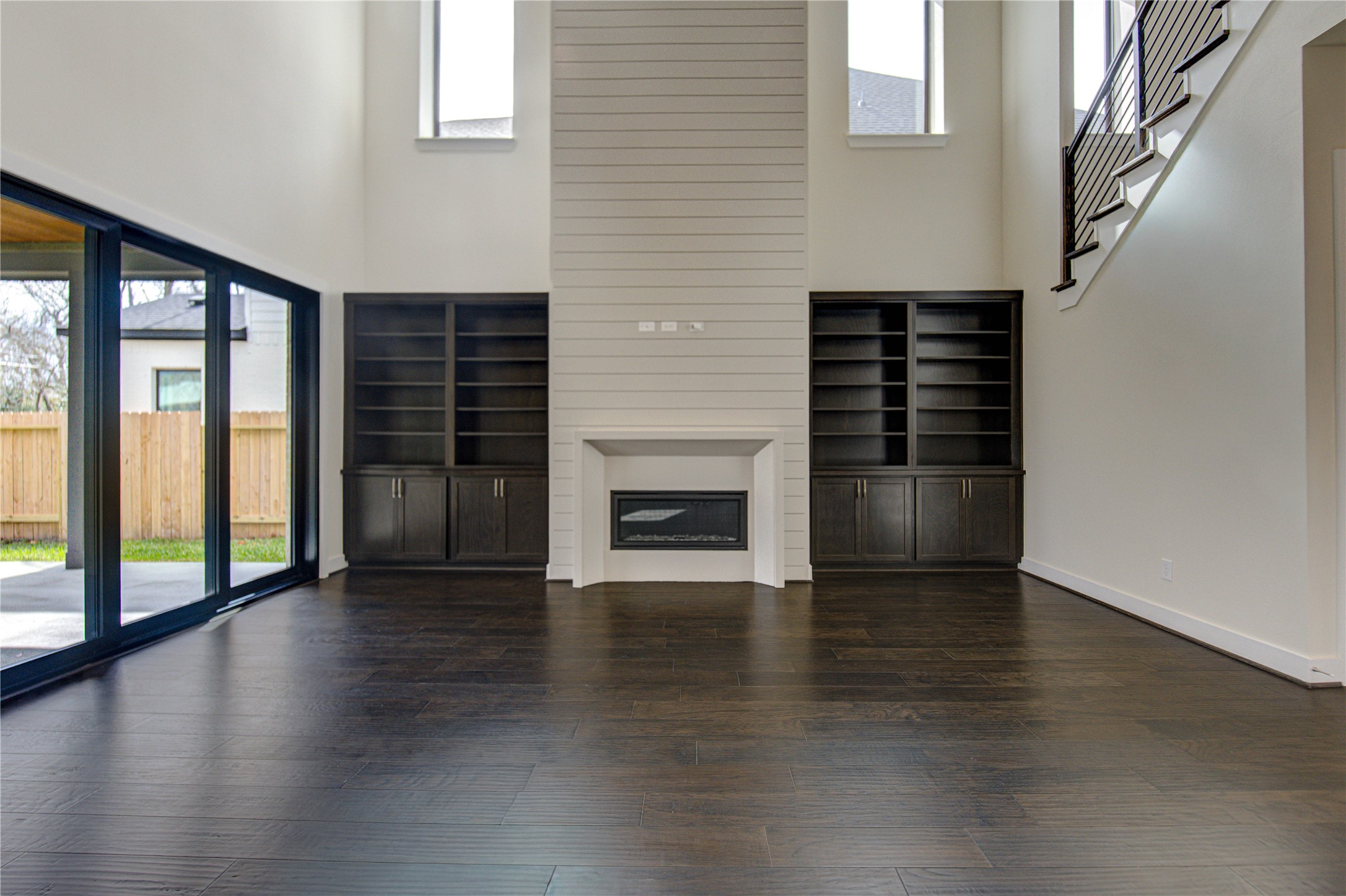 1504 Story Street Houston, TX 77055 - Photo 13 of 45 Stunning living room is perfectly located between access to the covered patio and the kitchen.