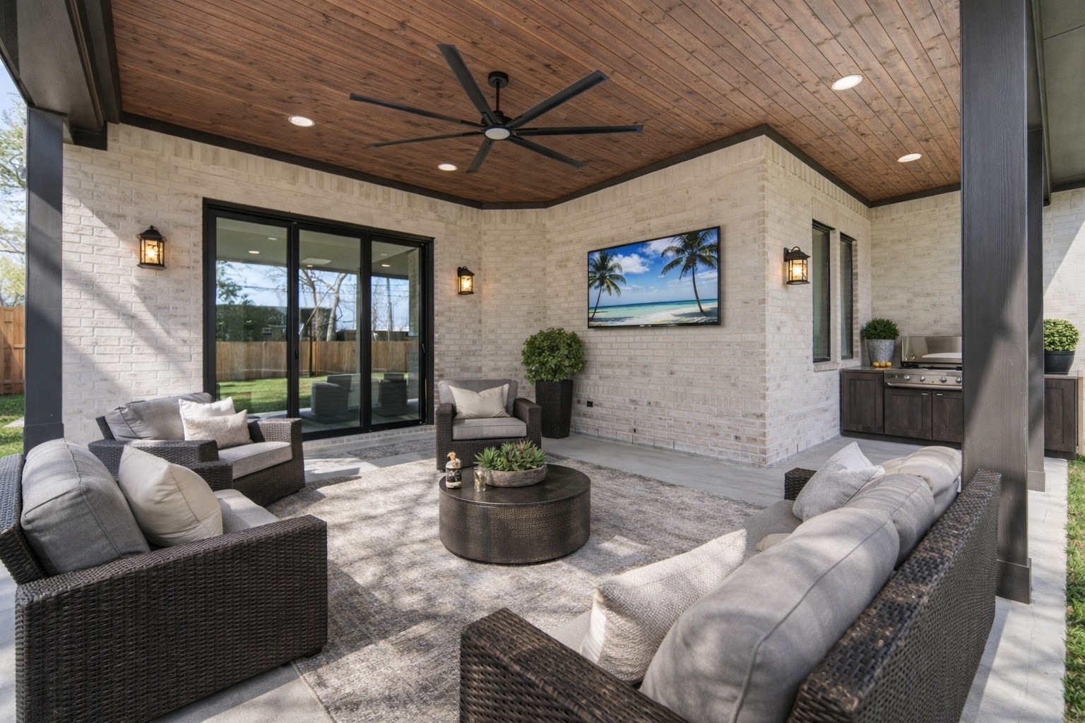 1504 Story Street Houston, TX 77055 - Photo 16 of 45 Stunning outside covered area that is preplumbed for an outdoor kitchen. *This home is virutally staged and the outdoor kitchen show is for ideas