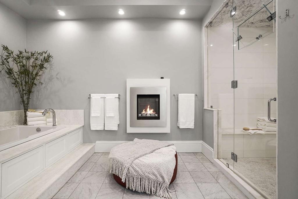 33 Beaver Place Boston, MA 02108 - Photo 11 of 22 a spacious bedroom with a bed and a couch