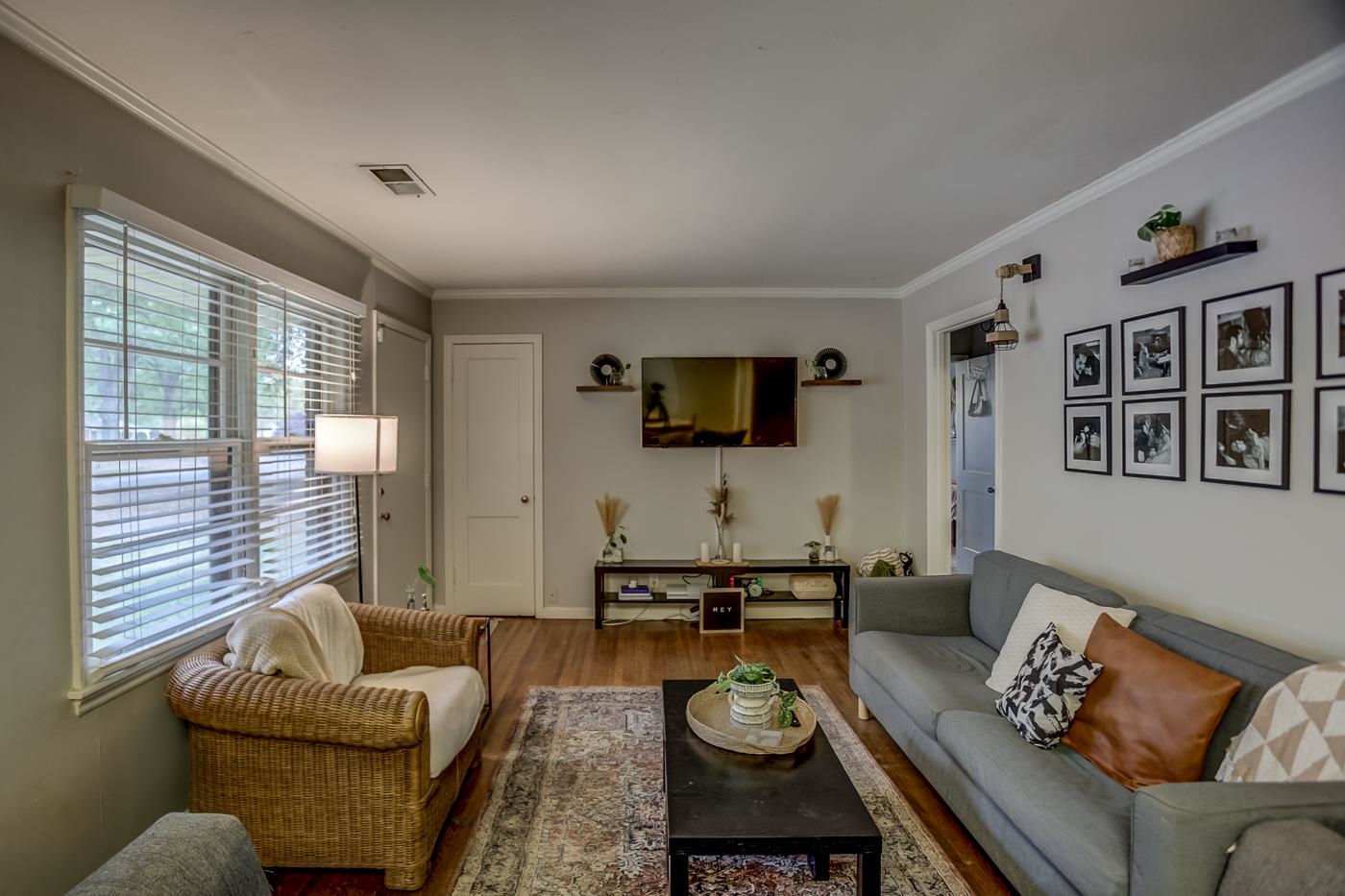 4464 Helene Road Memphis, TN 38117 - Photo 5 of 27 a living room with furniture and a flat screen tv