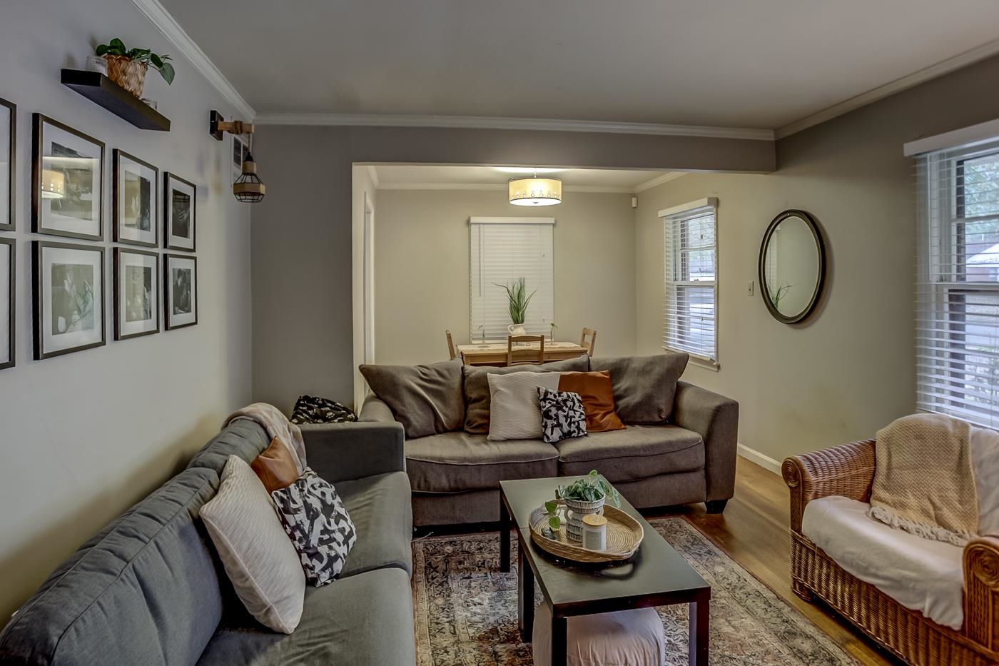 4464 Helene Road Memphis, TN 38117 - Photo 7 of 27 a living room with furniture and a large mirror next to a window