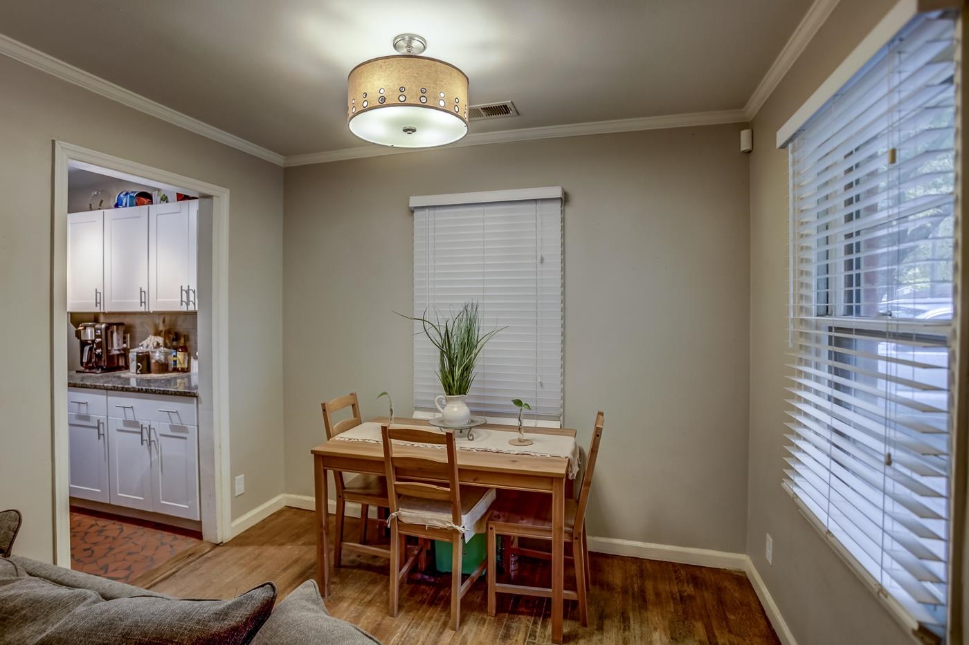 4464 Helene Road Memphis, TN 38117 - Photo 9 of 27 a view of a dining room with furniture and wooden floor