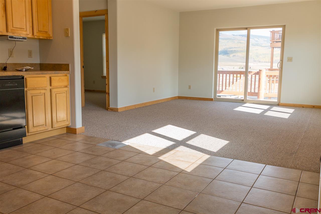 25 Elk Valley Road, Unit 102 Crested Butte, CO 81224 - Photo 3 of 12 an empty room with windows