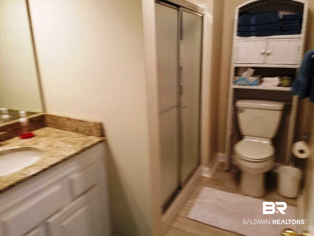28875 Perdido Beach Boulevard, Unit 1A Orange Beach, AL 36561 - Photo 16 of 25 Vanity/Shower & water closet